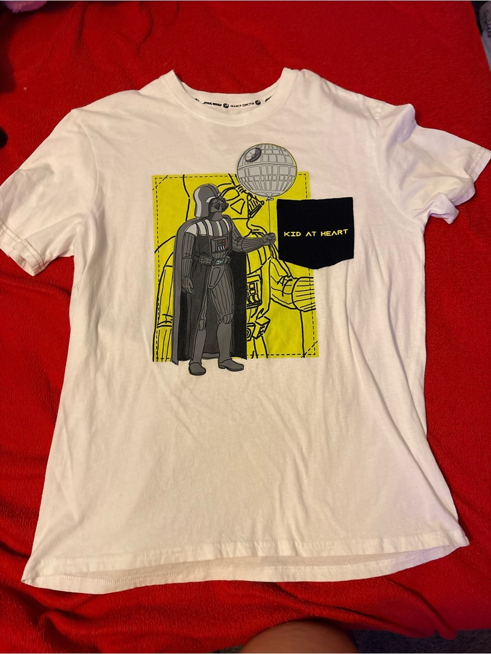 Disney White Graphic Tee with Yellow Panel and Black Pocket
